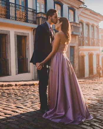Man Kissing Woman's Forehead in the Middle of the Street