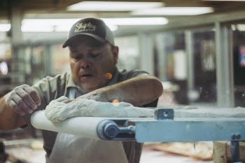 Man Kneading White Dough