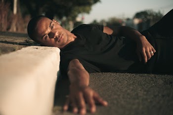Man Laying On Road