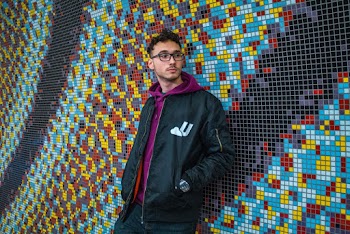 Man Leaning On Wall