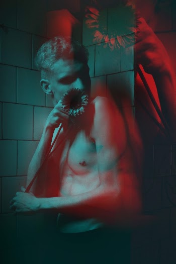 Man Leaning on Wall
