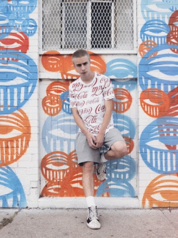 Man Leaning On Wall