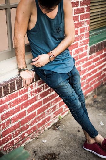 man leaning on window