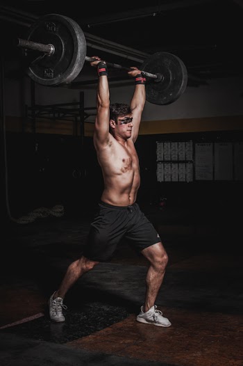Man Lifting A Barbell
