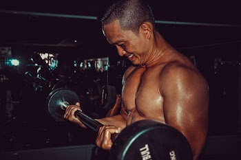 Man Lifting Barbell