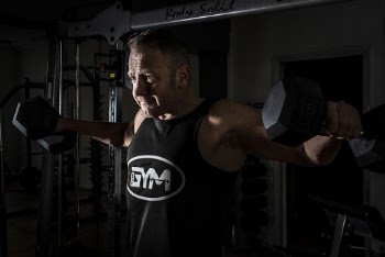 Man Lifting Dumbbells