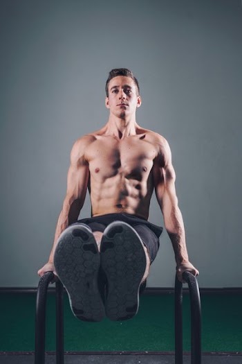 Man Lifting On Bars