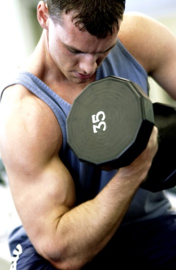 man lifting weights