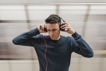 Man Listening To Headphones