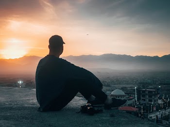 Man Looking at City