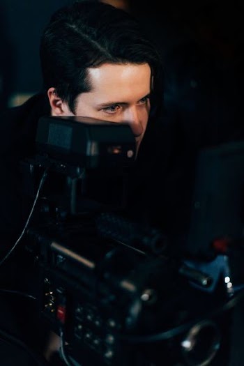 man looking at the monitor