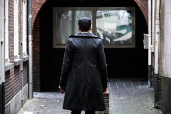 Man Looking at the Window