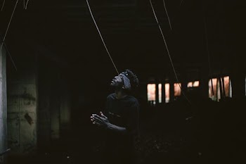 man looking upstairs