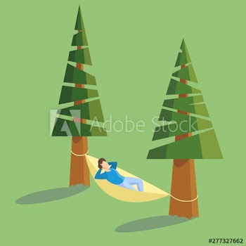 Man lying in a hammock hanging between tree