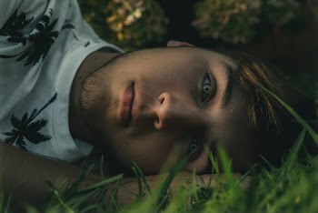Man Lying on Grass
