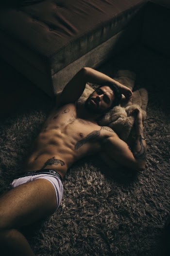 Man Lying on Rug
