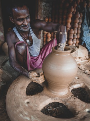 Man Making Clay Pot