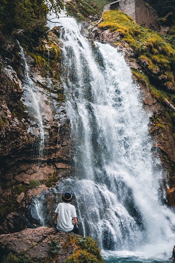 Man Near Waterfall