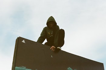 Man on Black Wall