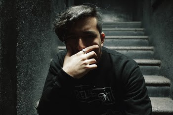 Man on Concrete Stairs