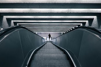 man on escalator turned on