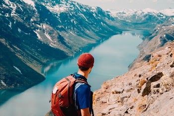 man on mountain edge