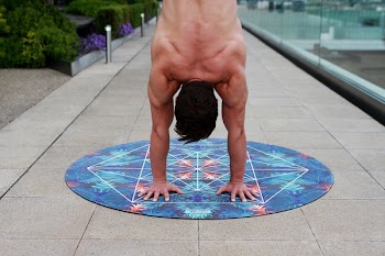 Man On Round Blue Floral Mat