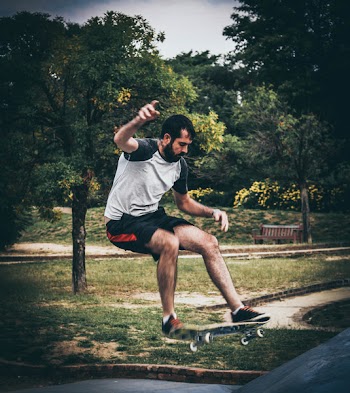 Man On Skateboard Doing Tricks