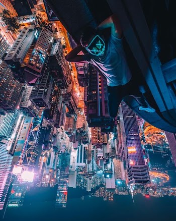 man on top of building