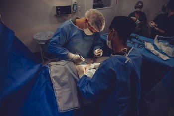 Man Operating a Surgery