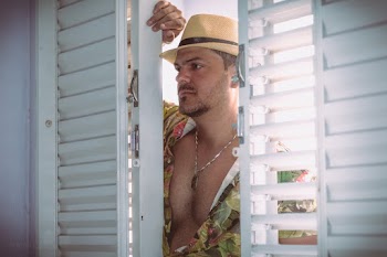Man Peeking on Opened Window