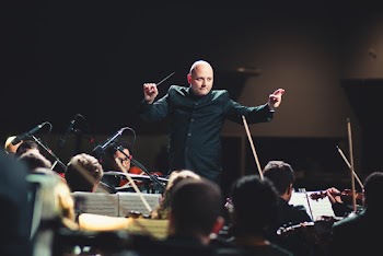 Man Performing on Stage