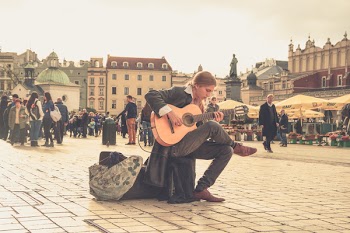 Man Playing Acoustic Guitar