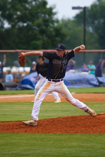 Man Playing Baseball