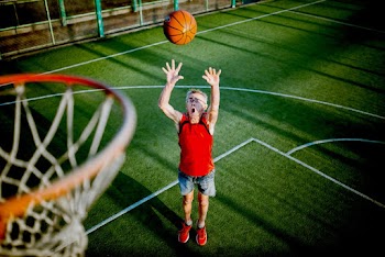 Man Playing Basketball