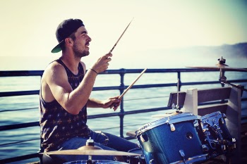 Man Playing Drums