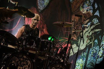 Man Playing Drums on Stage at Rock Metal Concert
