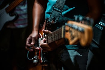 Man Playing Electric Guitar
