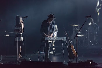 man playing electronic keyboard