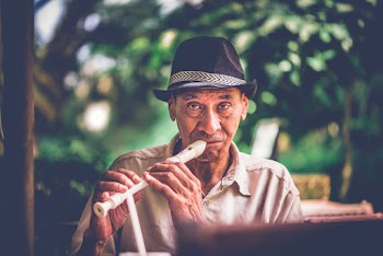 Man Playing Flute