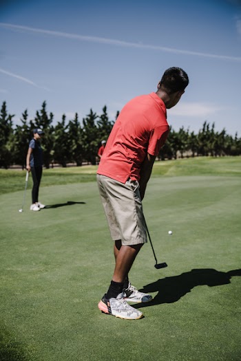 Man Playing Golf
