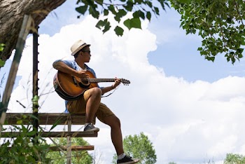 Man Playing Guitar