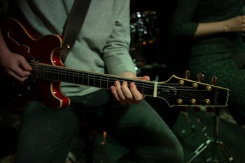 Man Playing Guitar