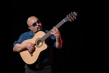Man Playing Guitar