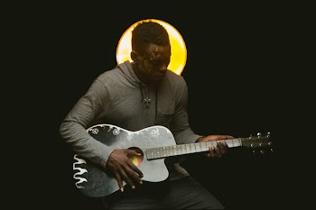 Man Playing Guitar