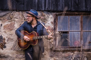 Man Playing Guitar