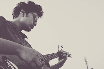 Man Playing Guitar
