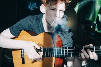 Man Playing Guitar