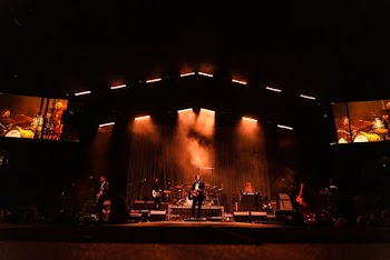 Man Playing Guitar at Nighttime
