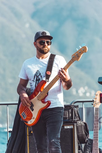 Man Playing Guitar On Stage